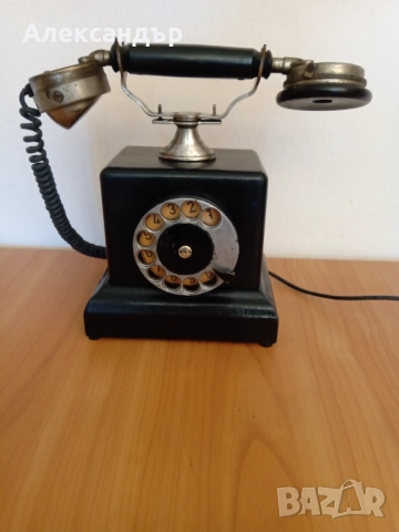 Български ретро телефон →
		Обява 52412498