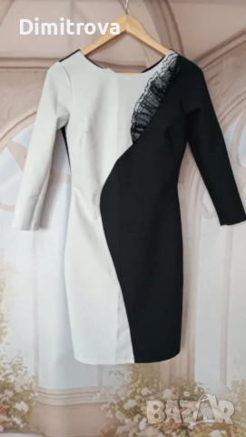 Елегантна рокля в черно и бяло с дантелен елемент