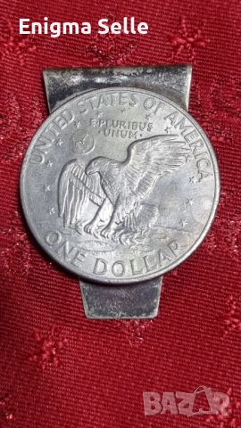 Щипка за пари, направена от монета от $1 "Айзенхауер". 