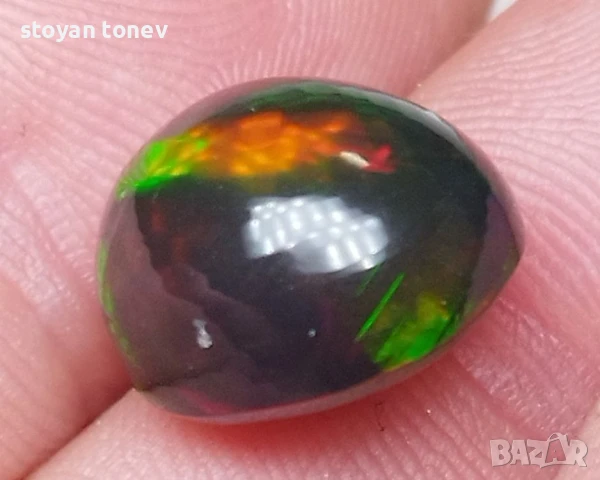 Голям черен опал с изумяваща игра на цветове тип дъга 6.59кт! Нов!, снимка 7 - Други - 50923569