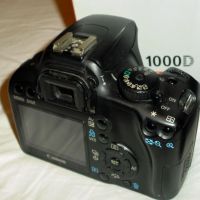 Фотоапарат DSLR Canon EOS 1000D / EF-S 18-55 IS . 50мм /1.8 . EF-S 35-80mm /​, снимка 3 - Фотоапарати - 45276659