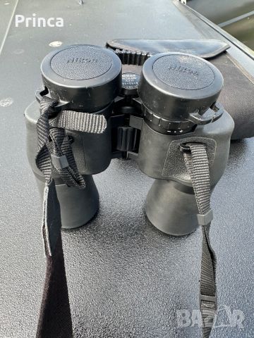 Продавам бинокъл Nikon action a211 12x50, снимка 2 - Спортна екипировка - 45235078