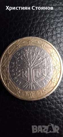 Френска монета от номинал 1 евро изобразяваща "дървото на живота"