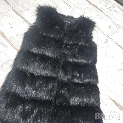 Дамски елек