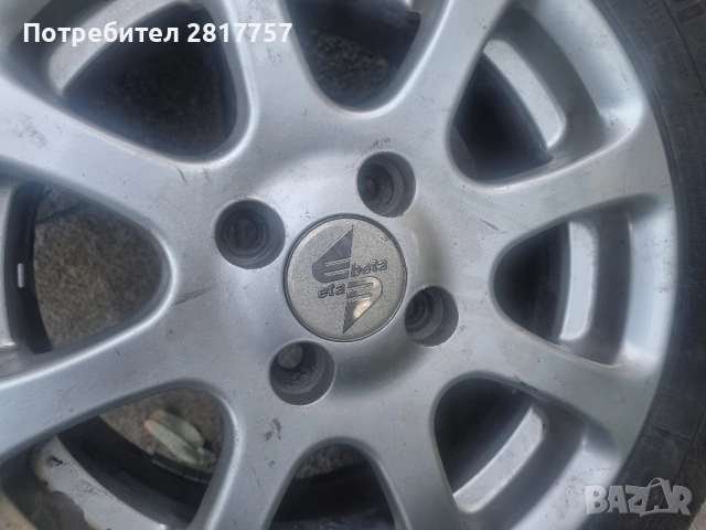 14 цола 4х100 4 броя алуминиеви джанти с гуми 185/60/14, снимка 4 - Гуми и джанти - 52267659