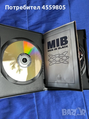 DVD Men in black Специално издание в два диска. , снимка 2 - DVD филми - 53209171