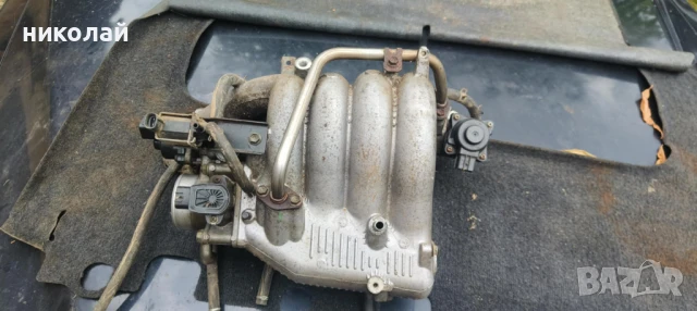 всмукателен колектор за сузуки гранд витара 2.0  128кс 2004