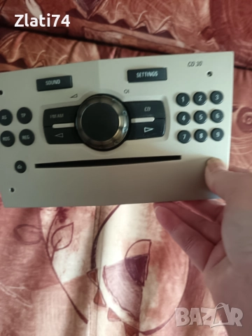 Оригинален CD PLAYER за OPEL CORSA D 1.2 2008