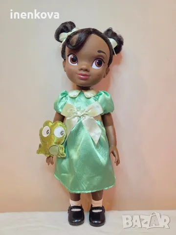 Кукла Тиана (Принцесата и жабокът)
42см.
Оригинална кукла на Дисни 
55лв.
, снимка 3 - Кукли - 50425771