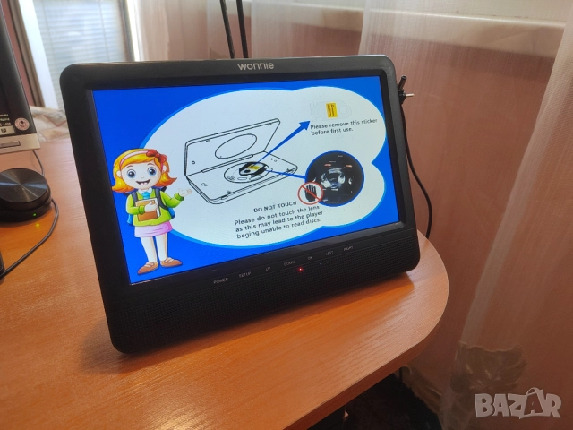 Портативен 10.5 инчов DVD/CD/MP3/USB/SD медия плеър Wonnie, снимка 6 - Плейъри, домашно кино, прожектори - 51513590