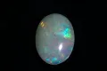 Етиопски опал 3.35ct овален кабошон, снимка 2