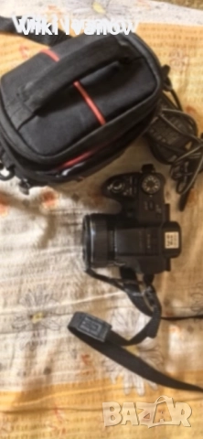 Фотоапарат СОНИ DSC-HX100V