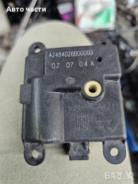 Задвижващ механизъм/мотор на клапата на климатика Chevrolet Aveo A2484026B00003, снимка 1