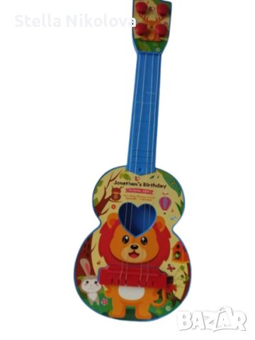 Детска китара с пластмасови струни, снимка 1 - Музикални играчки - 45415031