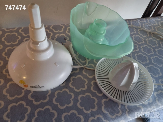 Електрическа цитрус преса Optimum, снимка 2 - Сокоизстисквачки и цитрус преси - 53198371