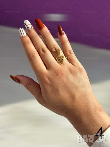 Хубав дамски златист пръстен тип змия от медицинска стомана, снимка 3 - Пръстени - 46112893