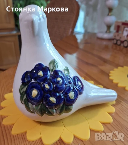 Порцеланово птиче на Роза Люнг