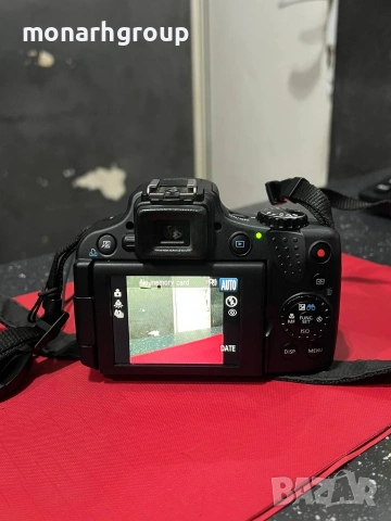 Фотоапарат Canon sx50hs със зарядно и чанта