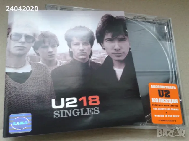 U2 – U2 18 Singles лицензен диск, снимка 1 - CD дискове - 48295980