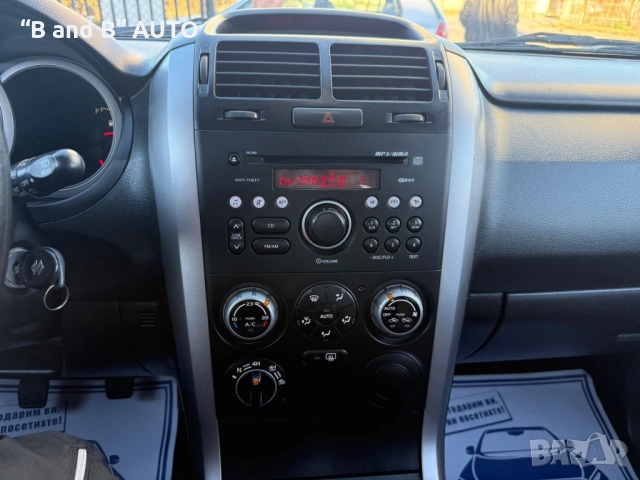 Suzuki Grand Vitara 1.9 Дизел, Климатик, 4х4, снимка 14 - Автомобили и джипове - 53053170