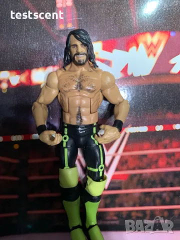 Екшън фигура WWE Seth Rollins Сет Ролинс Mattel Elite figure играчка neon yellow & black, снимка 14 - Колекции - 49152214