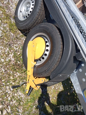 СКОБА ЗА ЗАКЛЮЧВАНЕ НА КОЛЕЛО НА РЕМАРКЕ ПРОТИВ КРАЖБА