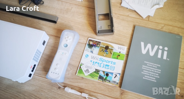 Nintendo Wii пълен комплект с кутия два контролера и игра , снимка 4 - Nintendo конзоли - 52802529