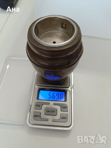Колекционерска запалка със сребърна поставка

, снимка 2 - Антикварни и старинни предмети - 46373052
