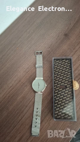 Продавам дамски часовник Avon Gy5LF9 – елегантен модел с камъчета, снимка 6 - Дамски - 51147134