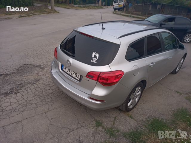 Opel Astra J Sports Tourer , снимка 4 - Автомобили и джипове - 46626370