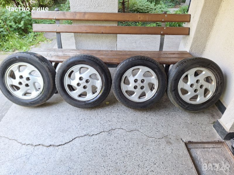 Продавам 4бр 14-ки джанти с летни гуми за Нисан Алмера , снимка 1