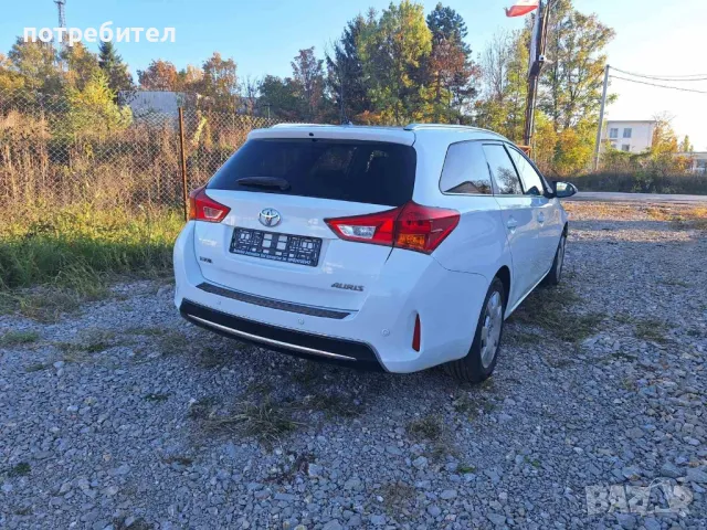 Продавам Toyota auris 2.0 D комби 125кс., снимка 6 - Автомобили и джипове - 47609278