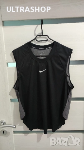 Дамски спортен потник Nike size L В отлично състояние, снимка 2 - Потници - 54207190