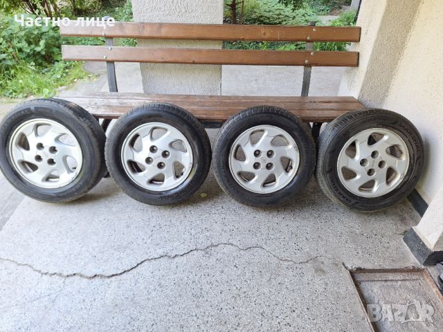 Продавам 4бр 14-ки джанти с летни гуми за Нисан Алмера , снимка 1 - Гуми и джанти - 45470295