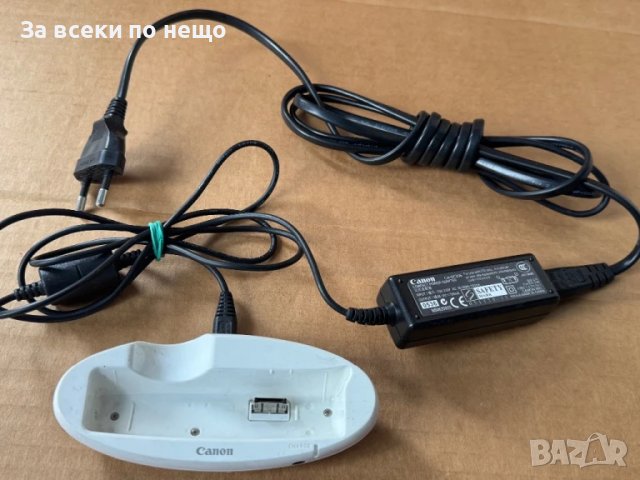 Оригинално зарядно за цифров фотоапарат ,  Canon CA-DC20E, снимка 2 - Батерии, зарядни - 50460235