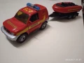 Метално Mitsubishi Pajero, с пластмасово ремарке с лодка; Каравана и ремаркета с лодки, 15 см., снимка 1