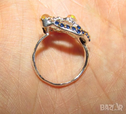 925 сребърен пръстен с етиопски опал, размер на камъка 4x3мм, общо тегло 4.9гр., снимка 4 - Пръстени - 46414187