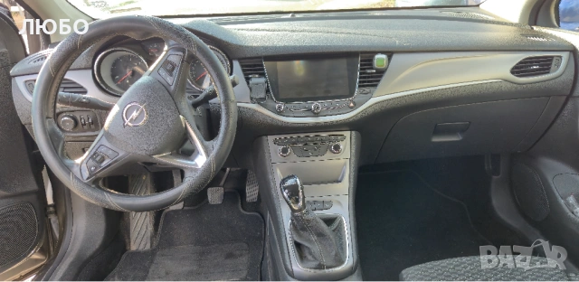 Opel Astra Sports Tourer, снимка 8 - Автомобили и джипове - 52752194