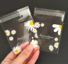 50 бр маргаритки цветя прозрачни опаковъчни пликчета торбички за дребни сладки ръчна изработка, снимка 1