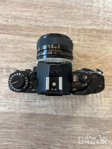 Canon A-1 с обектив Canon lens fd 50mm 1:1,4 S.S.C, снимка 3 - Фотоапарати - 52062393