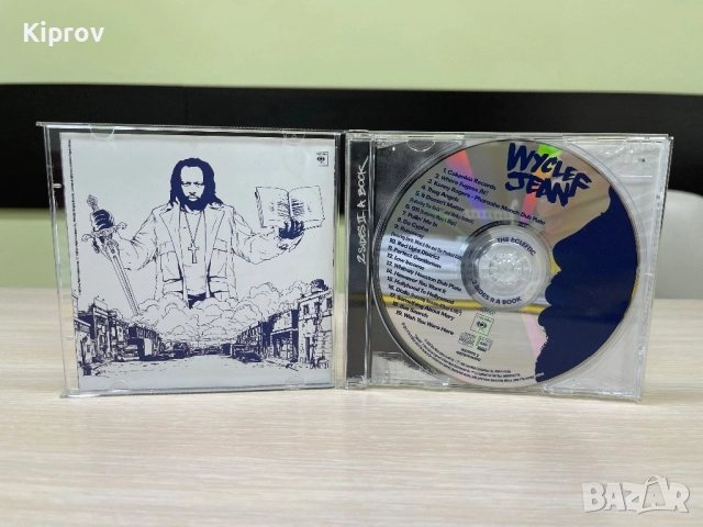 💿 Wyclef Jean – The Ecleftic: 2 Sides II a Book (оригинален CD), снимка 2 - CD дискове - 52200161