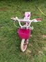 Велосипед за момиче с помощни колела 