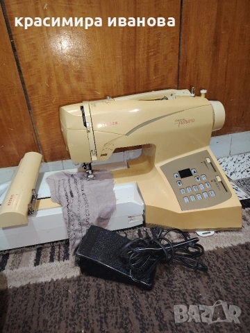 шевна машина Singer futura 