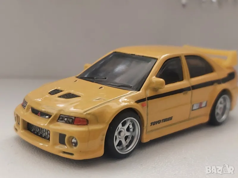 метална колекционерска количка Mitsubishi lancer evolution vi hot wheels , снимка 1