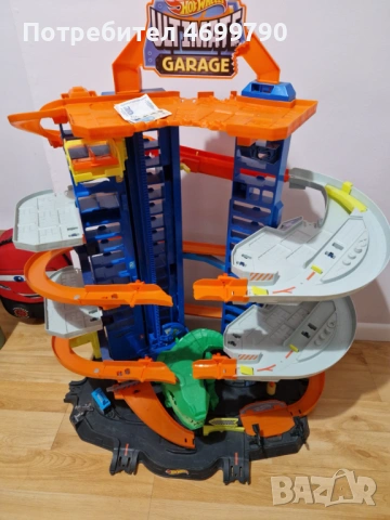 Hot Wheels City: Мега гараж Т-РЕКС", снимка 2 - Коли, камиони, мотори, писти - 53839202