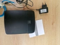 запазен работещ рутер на марка cisco - Linksys E1200, снимка 1