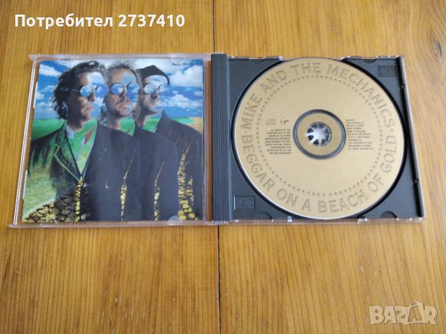 MIKE & THE MECHANICS - BEGGAR ON A BEACH OF GOLD 10лв оригинален диск, снимка 2 - CD дискове - 45287632