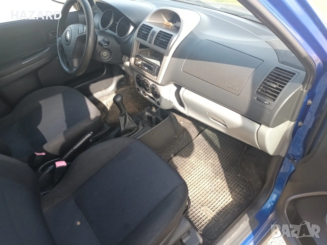 SUZUKI IGNIS 1,5, снимка 3 - Автомобили и джипове - 53900403