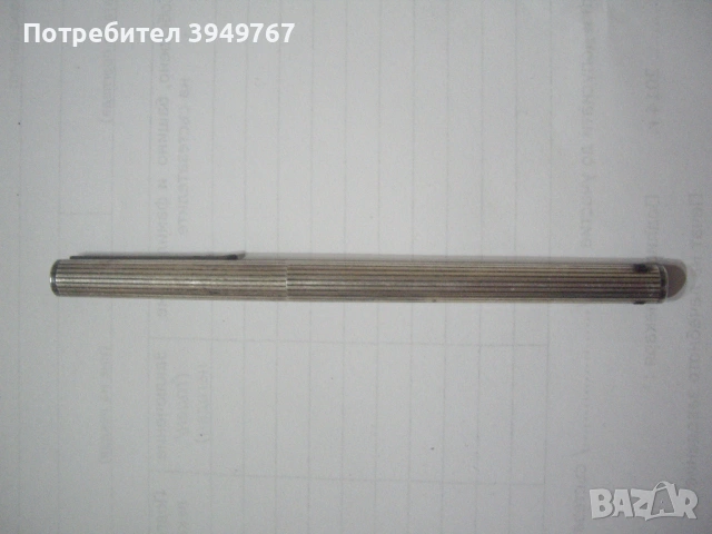 Стара сребърна химикалка.