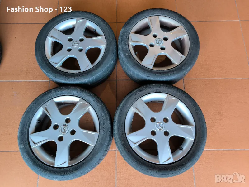 4 джанти 4x100 с гуми 195/50 r15 за Mazda, снимка 1